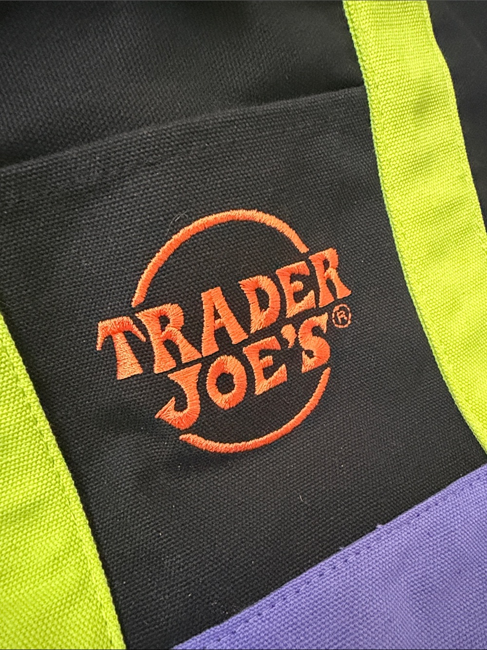 Trader Joe’s Trick or Treat Canvas Tote Bag in Purple, Black, Green, & Orange - Picture 3 of 7